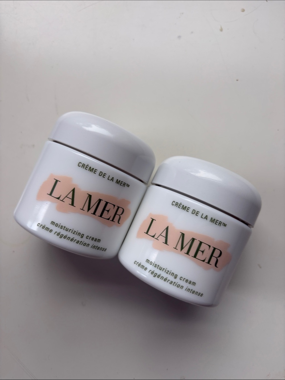 Two 3.4oz La Mer Moisturizing Cream White Jar empty